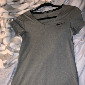 Tight fitting dri fit Nike workout shirt